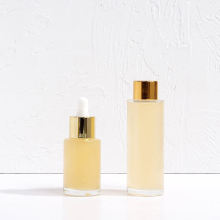 Cosmetic skincare packaging frosted glass bottle 50ml 100ml 120ml body lotion bottle empty gold silver pump bottle